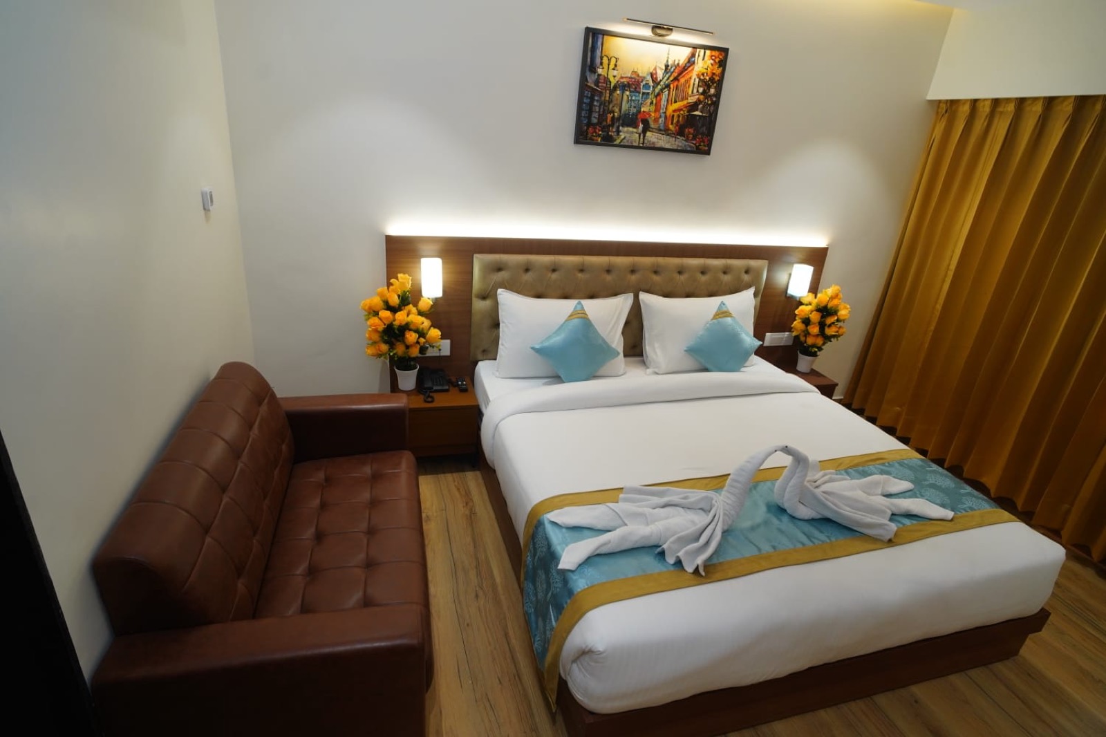 Executive Room at Hotel Veda Inn with spacious layout and workspace